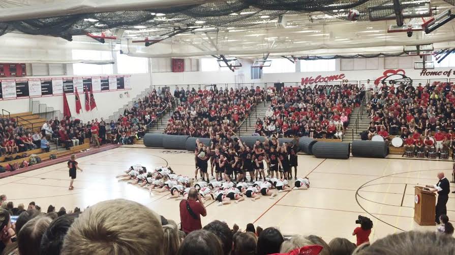 The Rhythm Knights and Varsity Football players stole the show at the Homecoming Pep Assembly with their annual dance!