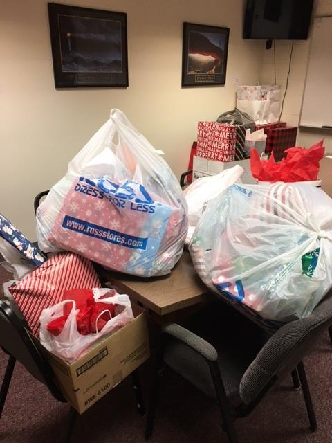 Gifts collected by LWC students - wrapped and ready for delivery to families in need!