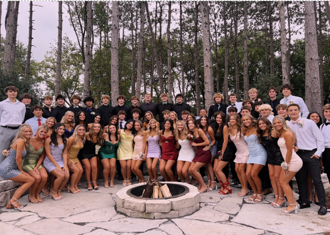 Students gather for group photos before the 2024 Homecoming Dance: Light up the Knight.