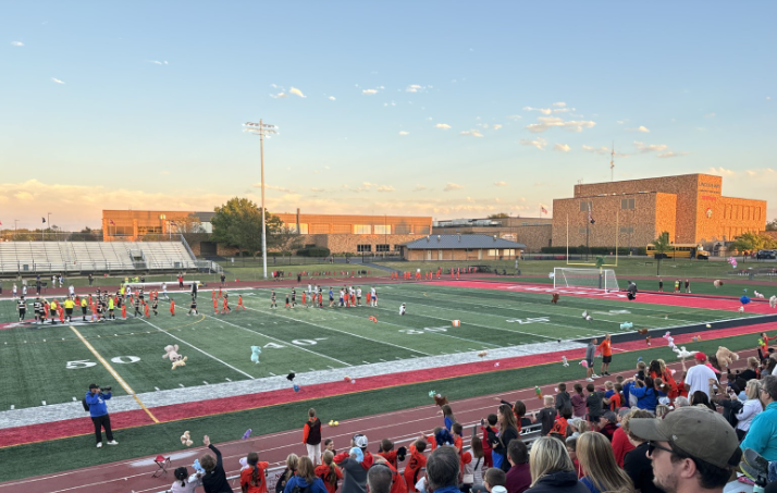 Fans toss teddy bears on the field at the LWC v. LWE Varsity soccer game.  