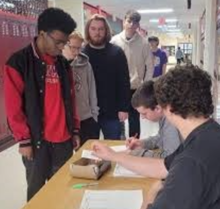 Students participate in the mock election set up by Social Science teachers.