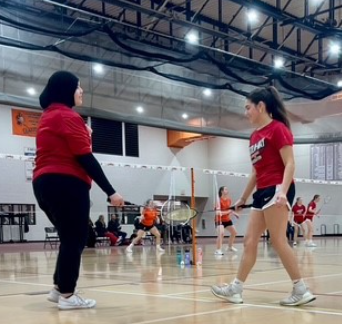 Nada Yasin (left) and Gabby Gatsios (right) in the middle of a tough match against Lincoln-Way West.